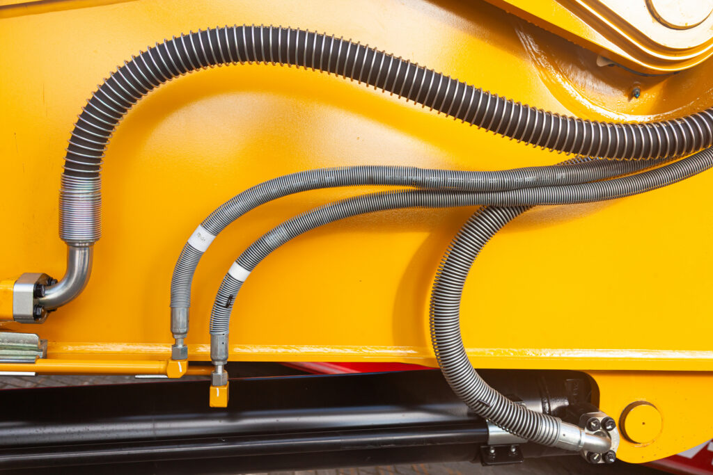 Hydraulic mechanisms of heavy loading equipment, close-up.